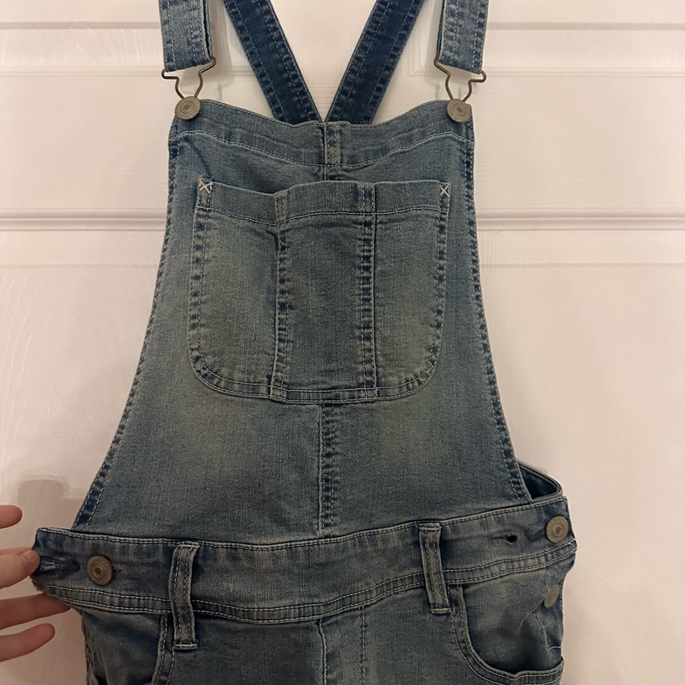 Blue denim overalls